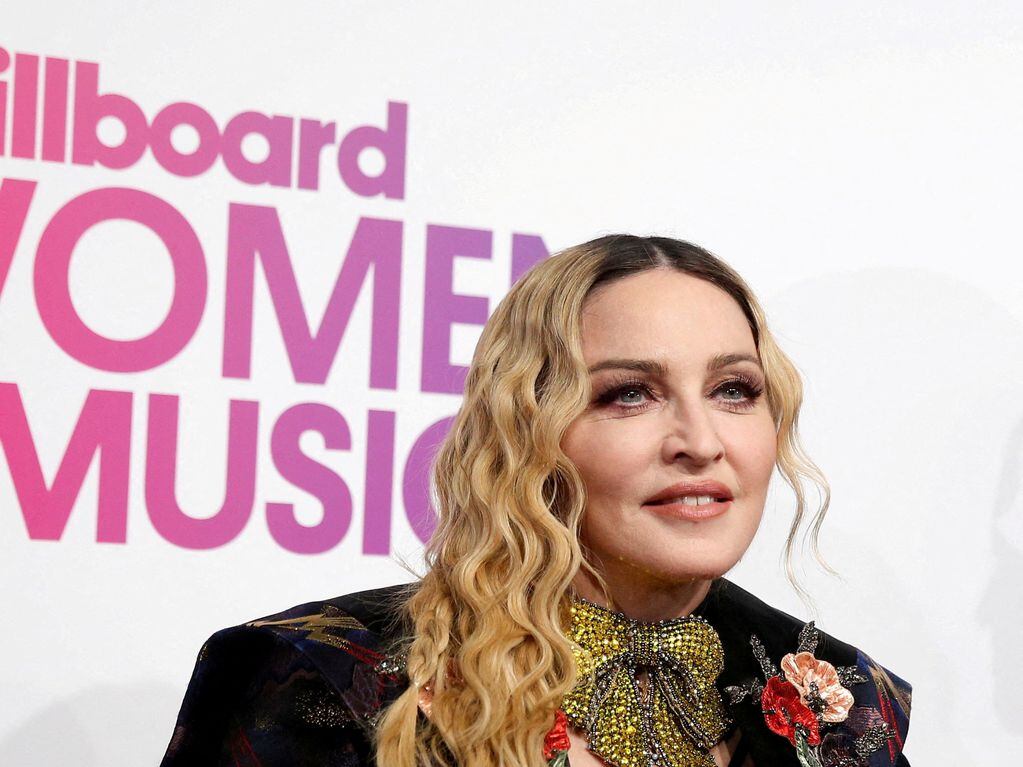 FILE PHOTO: Madonna poses on the red carpet a the Billboard Magazine's 11th annual Women in Music luncheon in New York, U.S., December 9, 2016.  REUTERS/Shannon Stapleton/File Photo