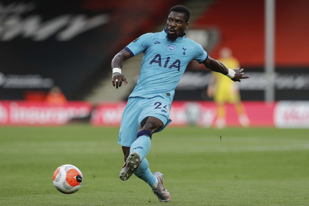 Tottenham's Serge Aurier kicks the ball during the English Premier League soccer match between Bournemouth and Tottenham at the Vitality Stadium in Bournemouth, England, Thursday, July 9, 2020. (AP Photo/Matt Dunham, Pool)