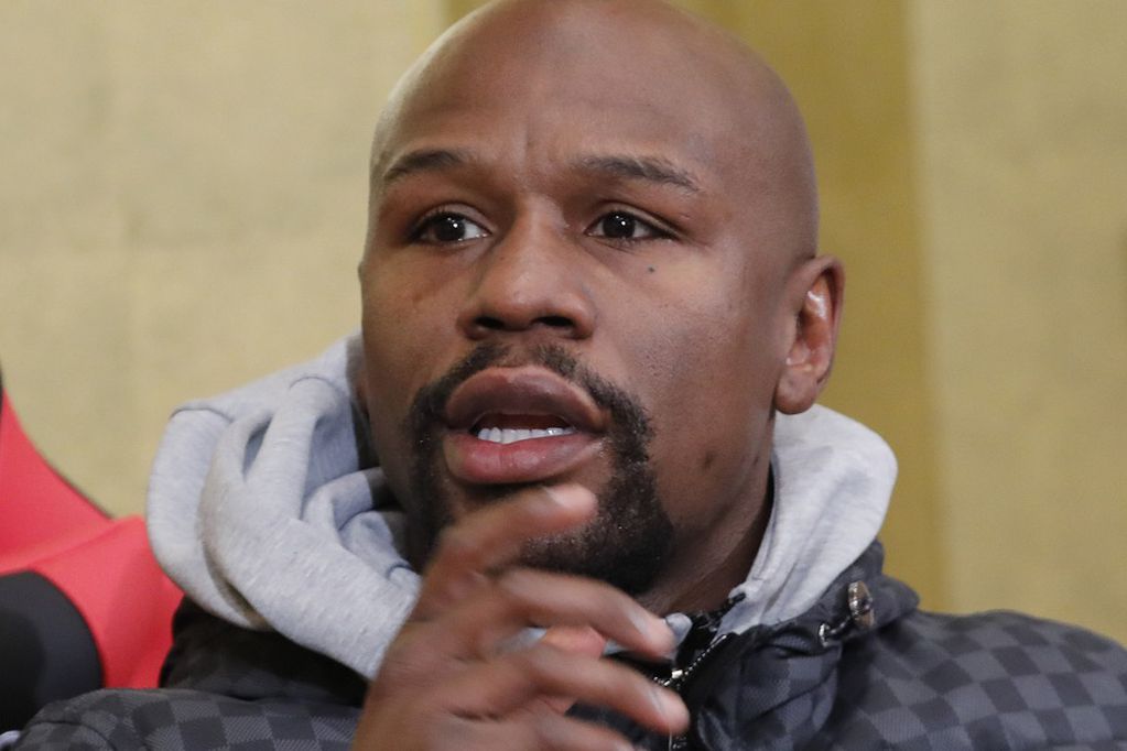 FILE - In this Dec. 29, 2018, file photo, Floyd Mayweather Jr. speaks during a news conference in Tokyo. Former boxing champion Mayweather has offered to pay for George Floyd’s funeral and memorial services, and the family has accepted the offer. Mayweather personally has been in touch with the family, according to Leonard Ellerbe, the CEO of Mayweather Promotions. He will handle costs for the funeral on June 9 in Floyd’s hometown of Houston, as well as other expenses. (AP Photo/Eugene Hoshiko, File)