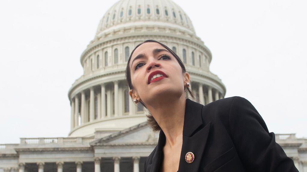 TOPSHOT - US Representative Alexandria Ocasio-Cortez, Democrat of New York, leaves a photo opportunity with the female Democratic members of the 116th US House of Representatives outside the US Capitol in Washington, DC, January 4, 2019. (Photo by SAUL LOEB / AFP)        (Photo credit should read SAUL LOEB/AFP via Getty Images)