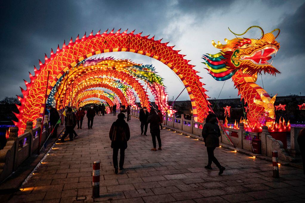 This photo taken on February 15, 2022 shows people visiting a lantern show during the Lantern Festival in Yantai in China's eastern Shandong province. (Photo by AFP) / China OUT