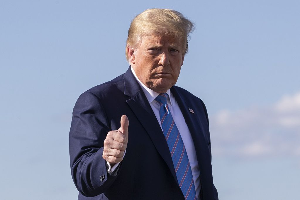 FILE - In this Sunday, June 14, 2020 file photo, President Donald Trump gives a thumbs-up while walking across the tarmac as he boards Air Force One at Morristown Municipal Airport, in Morristown, N.J. Trump is returning to Washington. A far-right Norwegian lawmaker says he has nominated President Donald Trump for the Nobel Prize 2021 for his efforts to reach a peace agreement in the Middle East. Christian Tybring-Gjedde, a member of the Norwegian Parliament for the far-right Progress Party, said on Wednesday, Sept. 9, 2020 that Trump should be considered for his work “for reaching a peace agreement between the United Arab Emirates and Israel which opens up for possible peace in the Middle East. (AP Photo/Alex Brandon, File)