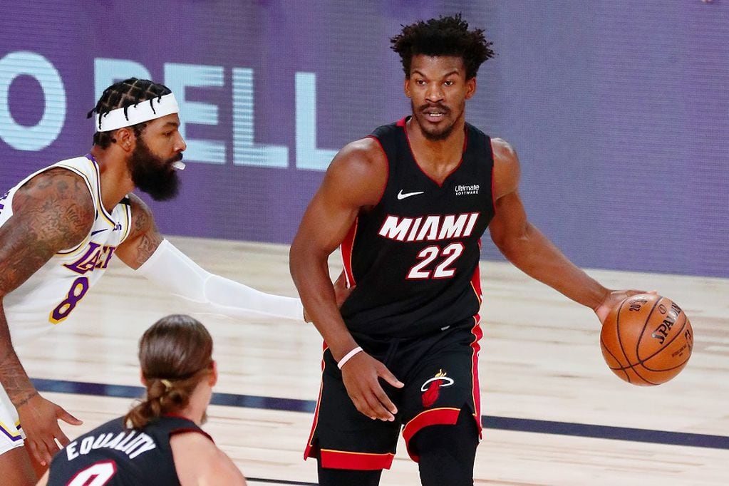 Oct 4, 2020; Orlando, Florida, USA; Miami Heat forward Jimmy Butler (22) dibbles against the Los Angeles Lakers during the first quarter of game three of the 2020 NBA Finals at AdventHealth Arena. Mandatory Credit: Kim Klement-USA TODAY Sports