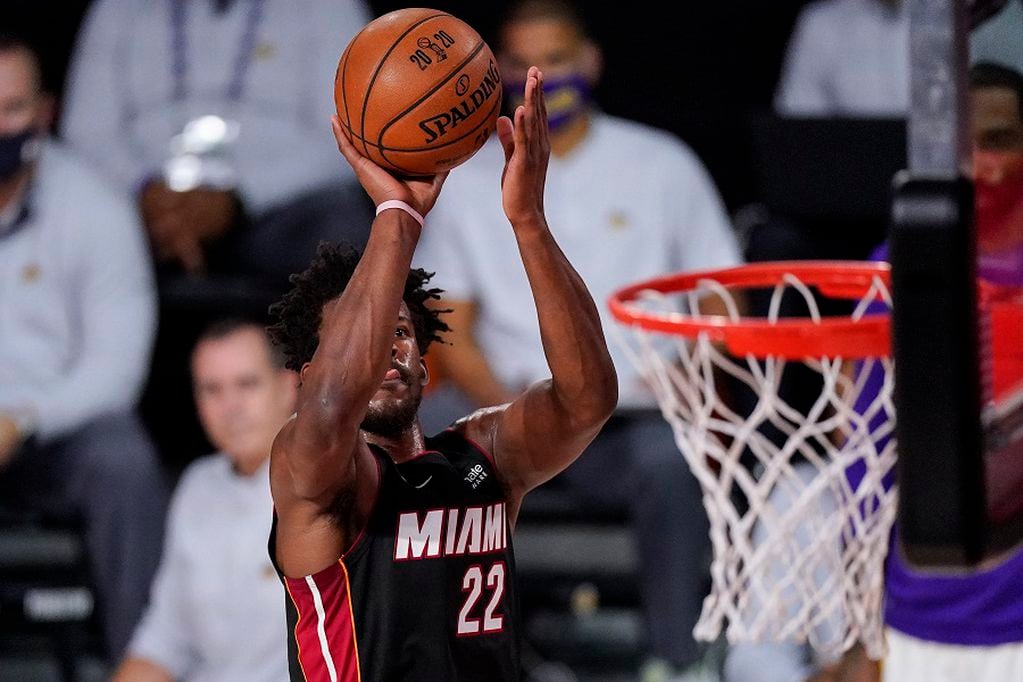 Miami Heat's Jimmy Butler (22) shoots the ball against the Los Angeles Lakers during the second half in Game 3 of basketball's NBA Finals, Sunday, Oct. 4, 2020, in Lake Buena Vista, Fla. (AP Photo/Mark J. Terrill)