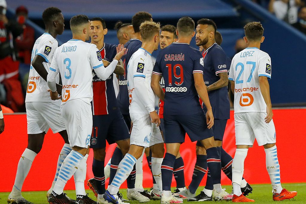PSG's Neymar, second right, after a clash during the French League One soccer match between Paris Saint-Germain and Marseille at the Parc des Princes in Paris, France, Sunday, Sept.13, 2020. (AP Photo/Michel Euler)