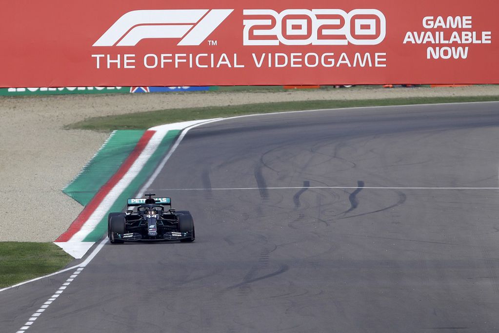 Mercedes driver Lewis Hamilton of Britain steers his car down the straightaway on the way to win the Emilia Romagna Formula One Grand Prix, at the Enzo and Dino Ferrari racetrack, in Imola, Italy, Sunday, Nov.1, 2020. (AP Photo/Luca Bruno, Pool)