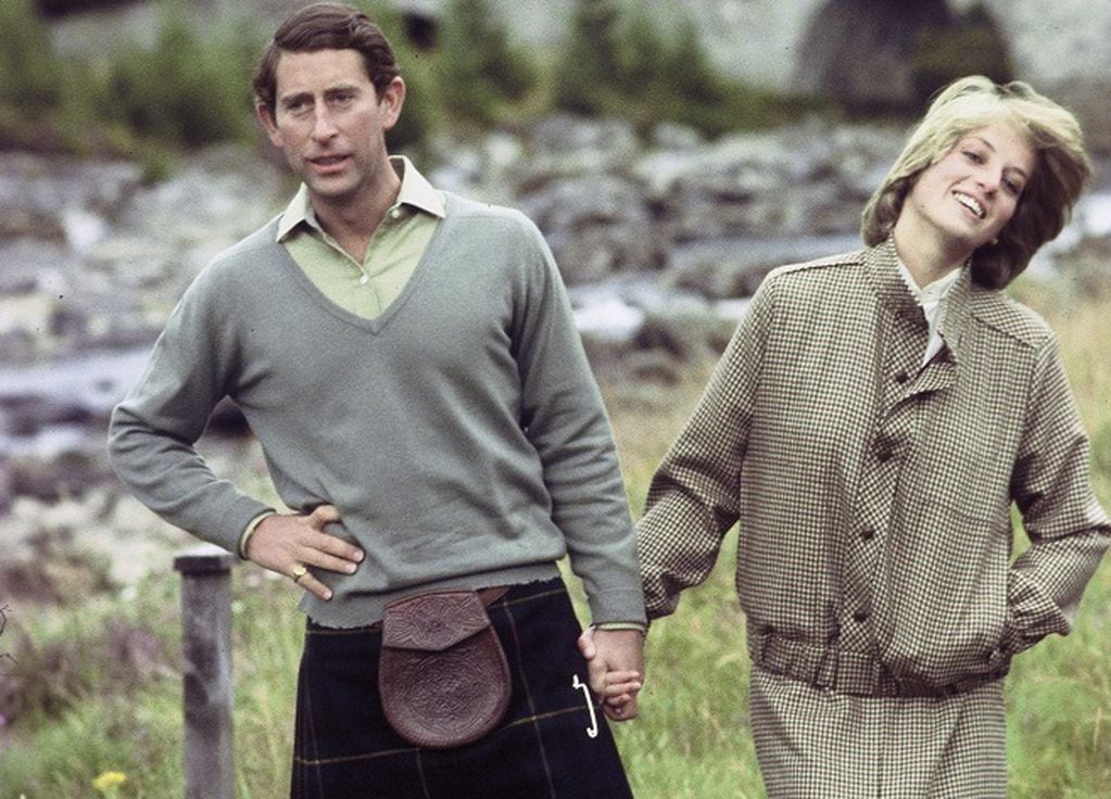 BALMORAL, SCOTLAND - AUGUST 1981:  Princess Diana, Princess of Wales, wearing tweed, and Prince Charles, Prince of Wales, wearing a kilt and sweater, pose for the press during their honyemoon August 1981 in Balmoral, Scotland.  (Photo by Anwar Hussein/WireImage) 