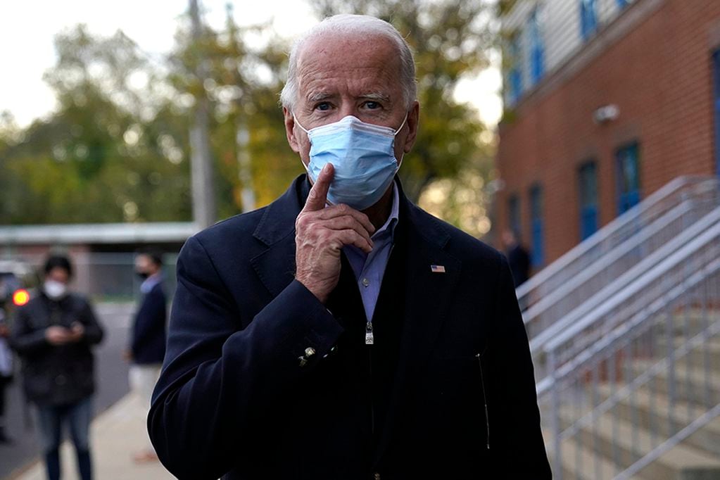 Democratic presidential candidate former Vice President Joe Biden speaks to reporters during a campaign stop in Wilmington, Del., Tuesday, Nov. 3, 2020. (AP Photo/Carolyn Kaster)