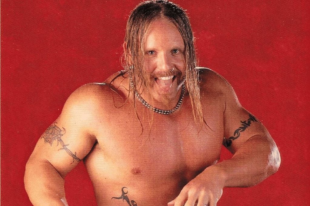 Droz trabajó como luchador para la compañía de Vince McMahon entre 1998 y 1999.