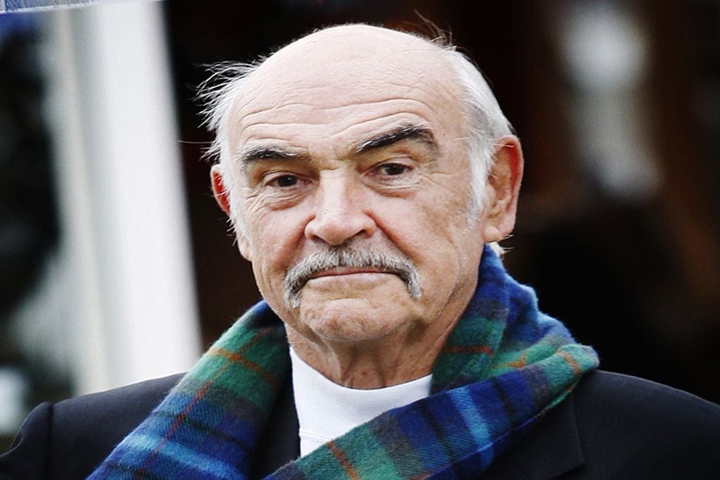 (FILES) In this file photo taken on August 25, 2008 British actor Sean Connery poses for photographers as he promotes his new book, called 'Being a Scot' at the Edinburgh International Book Festival, in Charlotte Square gardens, in Edinburgh. - Legendary British actor Sean Connery, best known for playing fictional spy James Bond in seven films, has died aged 90, his family told the BBC on October 31, 2020. The Scottish actor, who was knighted in 2000, won numerous awards during his decades-spanning career, including an Oscar, three Golden Globes and two Bafta awards. (Photo by ED JONES / AFP)