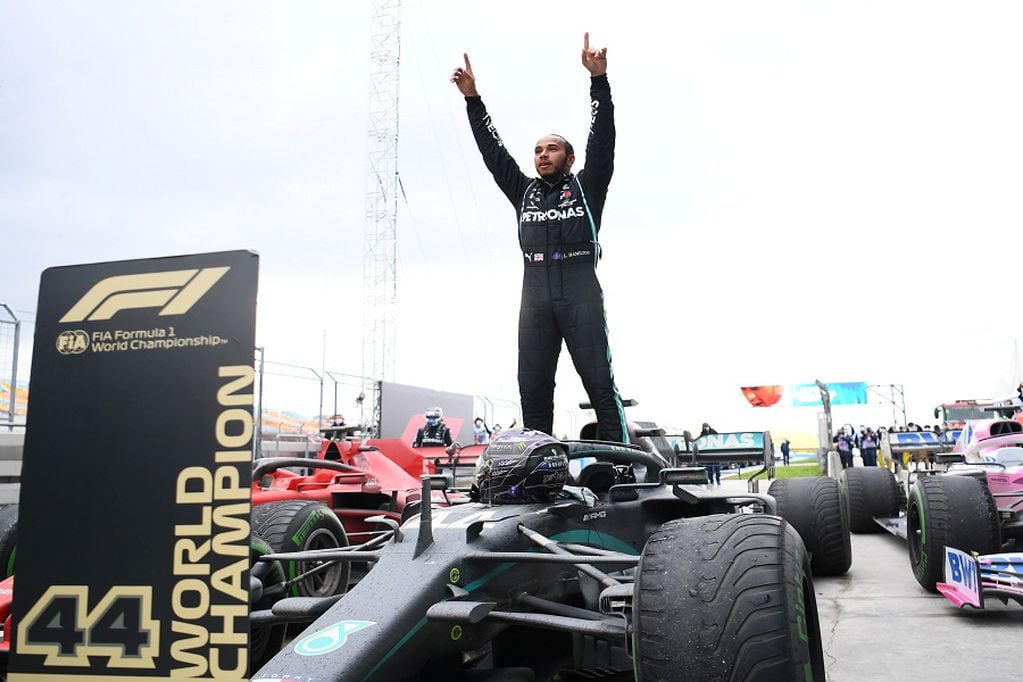 Formula One F1 - Turkish Grand Prix - Istanbul Park, Istanbul, Turkey - November 15, 2020 Mercedes' Lewis Hamilton celebrates after winning the race and the world championship Pool via REUTERS/Clive Mason     TPX IMAGES OF THE DAY