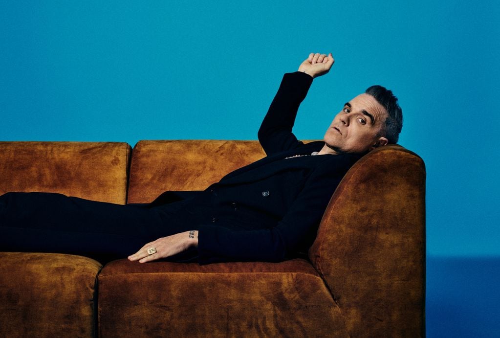 Drogas, amor, OVNIS y fantasmas: el complejo pasado que atormentó a Robbie Williams