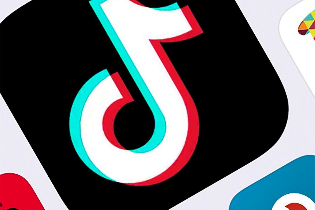 FILE - This Feb. 25, 2020, file photo, shows the icon for TikTok in New York. The video app said it will wage a legal fight against the Trump Administration’s efforts to ban the popular, Chinese-owned service over national-security concerns. TikTok, which is owned by China’s ByteDance, insisted that it not is a national-security threat and that the government is acting without evidence or due process. The company said it will file suit against the government later Monday, Aug. 24 in federal court in California.    (AP Photo/File)