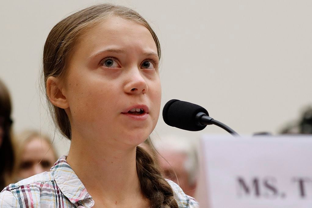 FILE - In this Wednesday, Sept. 18, 2019, file photo, youth climate change activist Greta Thunberg speaks at a House Foreign Affairs Committee subcommittee hearing on climate change, on Capitol Hill in Washington. Thunberg, 16, of Sweden, who accused international leaders of ignoring the dangers of global warming in a speech shared around the world is joining young fellow activists in Los Angeles on Friday, Nov. 1, for a protest aimed at getting California out of the oil-drilling business. (AP Photo/Jacquelyn Martin, File)