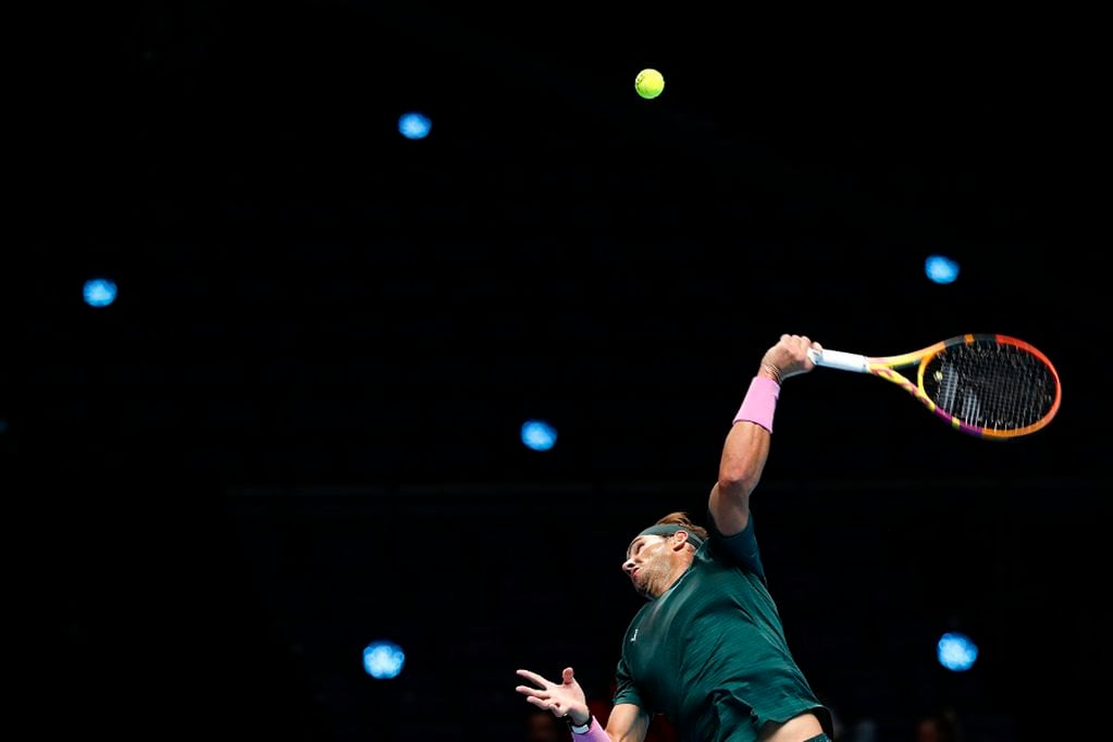 Rafael Nadal of Spain serves to Stefanos Tsitsipas of Greece during their tennis match at the ATP World Finals tennis tournament at the O2 arena in London on Nov. 19, 2020. (AP Photo/Frank Augstein)
