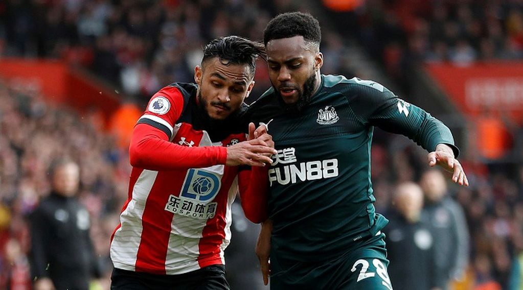FILE PHOTO: Soccer Football - Premier League - Southampton v Newcastle United - St Mary's Stadium, Southampton, Britain - March 7, 2020  Southampton's Sofiane Boufal in action with Newcastle United's Danny Rose   REUTERS/Peter Nicholls  EDITORIAL USE ONLY. No use with unauthorized audio, video, data, fixture lists, club/league logos or "live" services. Online in-match use limited to 75 images, no video emulation. No use in betting, games or single club/league/player publications.  Please contact your account representative for further details./File Photo