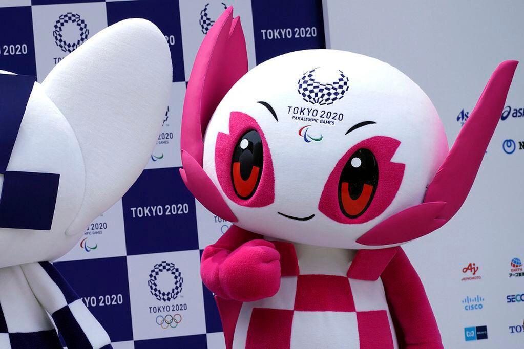 FILE - In this July 22, 2018, file photo, Tokyo 2020 Paralympic mascot "Someity" stands at stage during their debut event in Tokyo. The Tokyo 2020 Paralympic schedule remains essentially unchanged for the event postponed until next year, organizers said on Monday, Aug. 3, 2020. Tokyo organizers made the same announcement several weeks ago for the postponed Olympics. The Paralympics open on Aug. 24, 2021, and close on Sept. 5. The Olympics are to open on July 23. (AP Photo/Eugene Hoshiko, File)