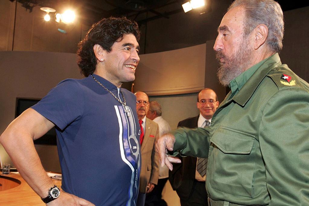 FILE - In this Oct. 27, 2005 file photo released by the Cuban government's National Information Agency (AIN), Cuban President Fidel Castro, right, meets Argentina's former soccer star Diego Maradona on the program "Mesa Redonda" in Havana, Cuba. The Argentine soccer great who was among the best players ever and who led his country to the 1986 World Cup title before later struggling with cocaine use and obesity, died from a heart attack on Wednesday, Nov. 25, 2020, at his home in Buenos Aires. He was 60. (AIN/Ismael Francisco via AP)