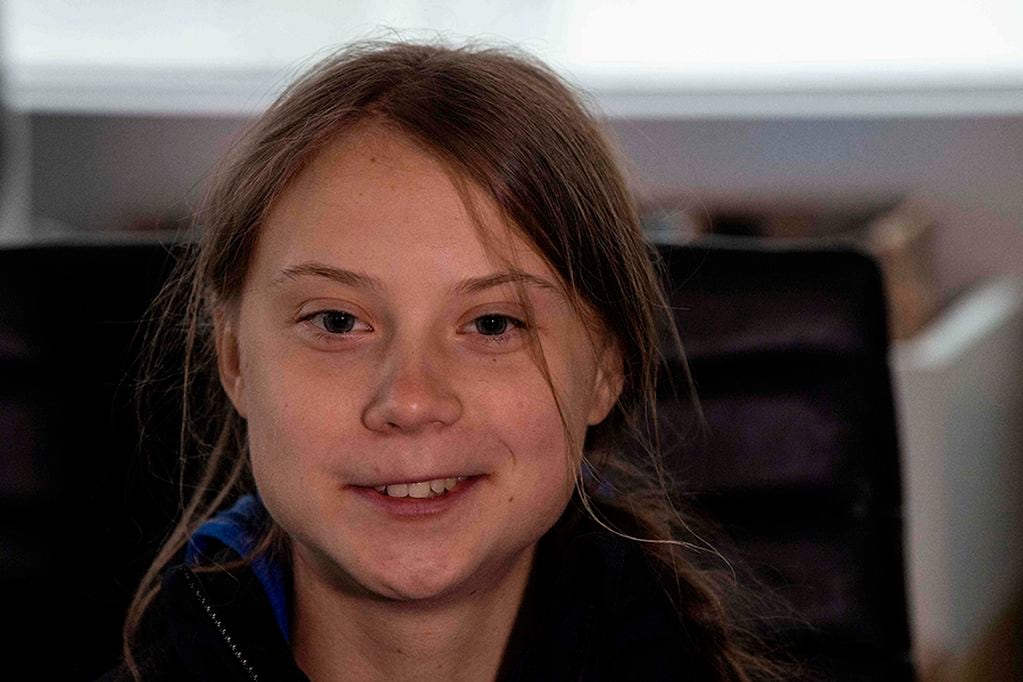 (FILES) In this file photo taken on November 12, 2019 Swedish climate activist Greta Thunberg speaks to AFP during an interview aboard La Vagabonde, the boat she will be taking to return to Europe, in Hampton, Virginia. - Greta Thunberg, the Swedish teenager who became the voice of conscience for a generation facing the climate change emergency, was named December 11, 2019 as Time magazine's 2019 Person of the Year. The 16-year-old first made  headlines with her solo strike against global warming outside Sweden's parliament in August 2018."We can't just continue living as if there was no tomorrow, because there is a tomorrow. That is all we are saying," Thunberg told Time. (Photo by NICHOLAS KAMM / AFP)