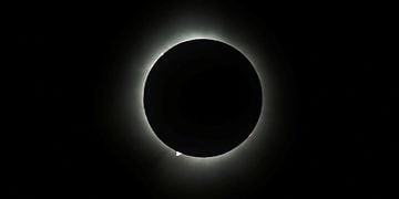 Total solar eclipse darkens skies over parts of North America