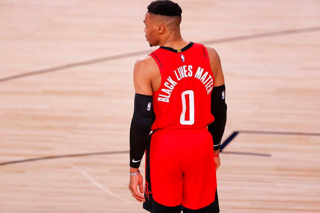 Aug 2, 2020; Lake Buena Vista, USA; Russell Westbrook #0 of the Houston Rockets wears "Black Lives Matter" on the back of his jersey against the Milwaukee Bucks at The Arena at ESPN Wide World Of Sports Complex on August 02, 2020 in Lake Buena Vista, Florida. Mandatory Credit: Mike Ehrmann/Pool Photo via USA TODAY Sports