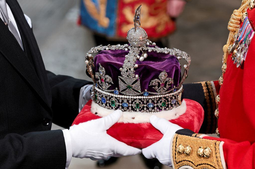 The Imperial State Crown arrives through the Sovereign's Entrance, ahead of the State Opening of Parliament, in the House of Lords Chamber in the Houses of Parliament in London, Britain, May 10, 2022. Chris Jackson/Pool via REUTERS