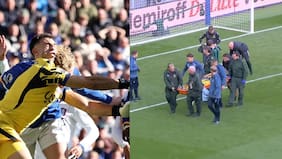 Dibu Martínez tuvo que salir en camilla de la cancha tras recibir impactante golpe