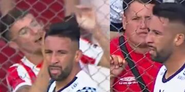 Hincha intenta escupir a Mauricio Isla, no le achunta y le cae a su amigo