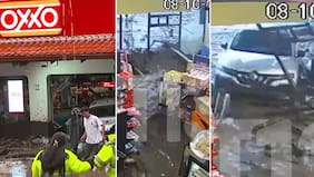 Reacción del atendedor no pasó desapercibida: el momento exacto en que aluvión arrasa con un Oxxo en Las Condes