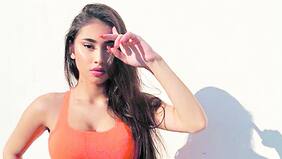 Paloma Mami sorprende con fotos playeras junto a reconocido reggaetonero