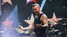Drogas, amor, OVNIS y fantasmas: el complejo pasado que atormentó a Robbie Williams