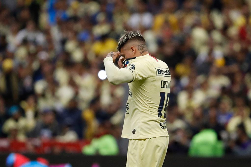 America's Nicolas Castillo reacts after failing to score in the penalty shoot out during the final leg match of the Mexican soccer league at Azteca stadium in Mexico City, Sunday, Dec. 29, 2019. (AP Photo/Eduardo Verdugo)